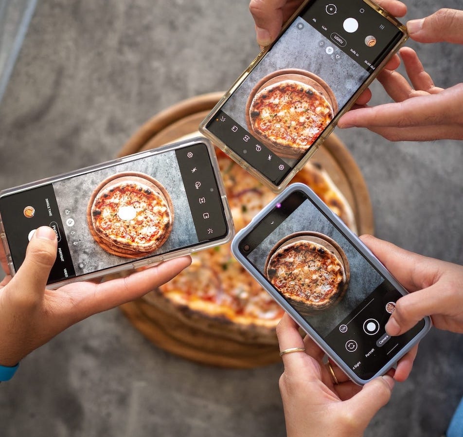 Pizza pictures on mobile phones.