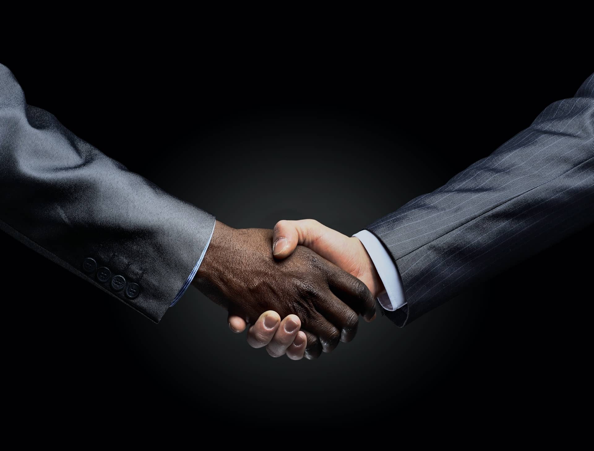 Handshake on a deal for purchasing technology