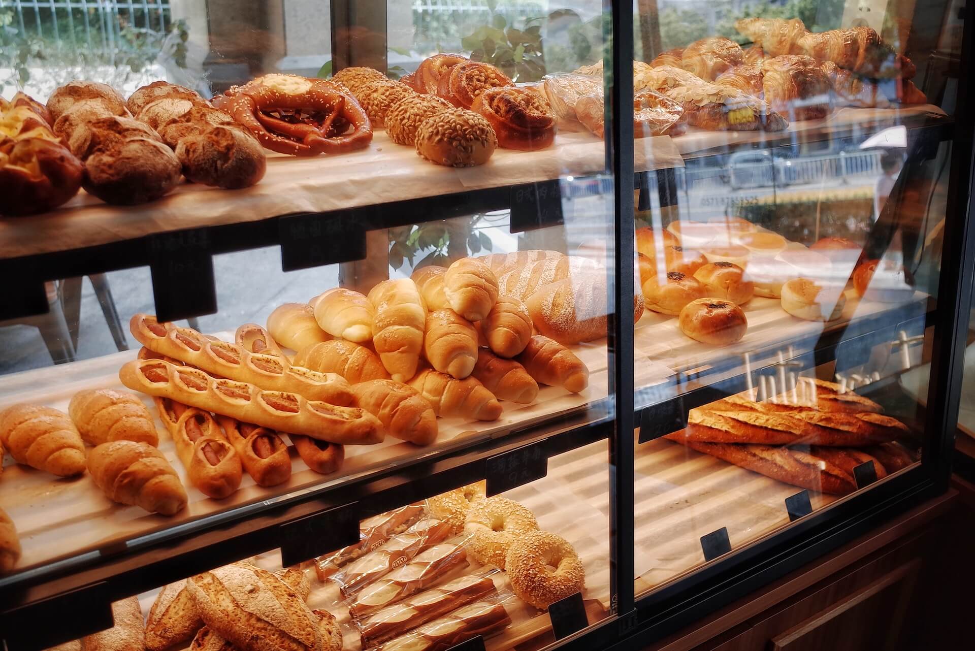 Bread and bakery products in glass display case