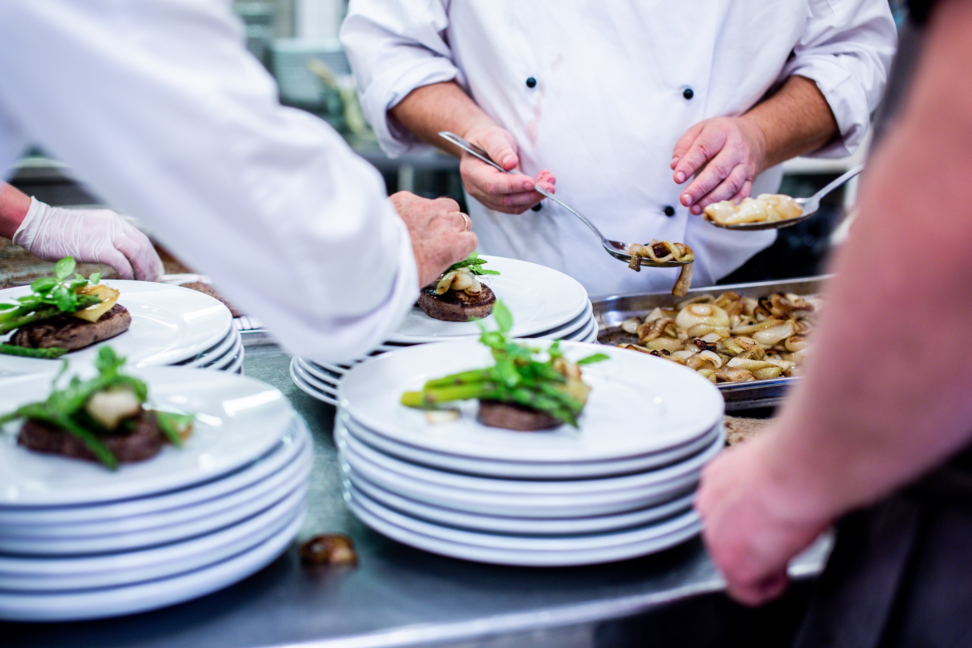 Laying out stylish dishes at restaurant