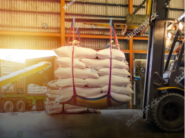 Forklift moving bags of food 
