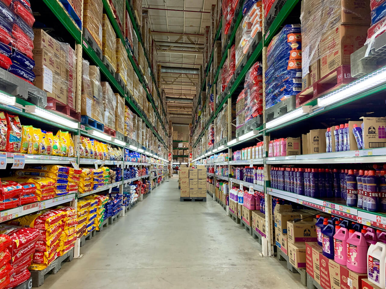 Racks of foodstuffs in large warehouse